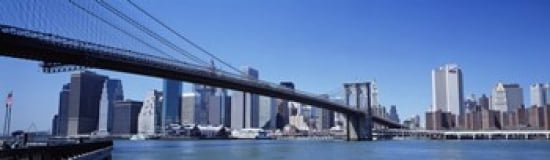 USA New York State New York City Brooklyn Bridge Skyscrapers in a city Canvas Art - Panoramic Images (38 x 12)