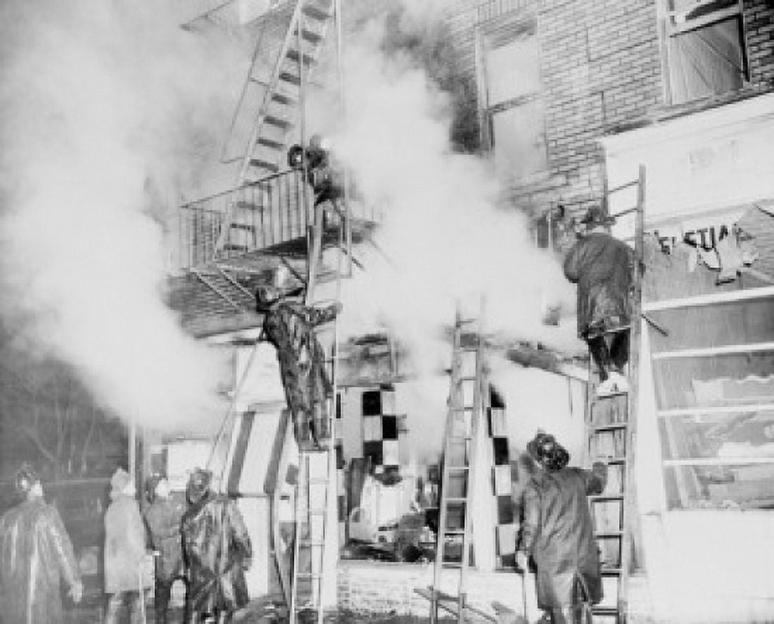USA New York State New York City Brooklyn Firemen fighting blaze at apartment house Canvas Art - (24 x 36)