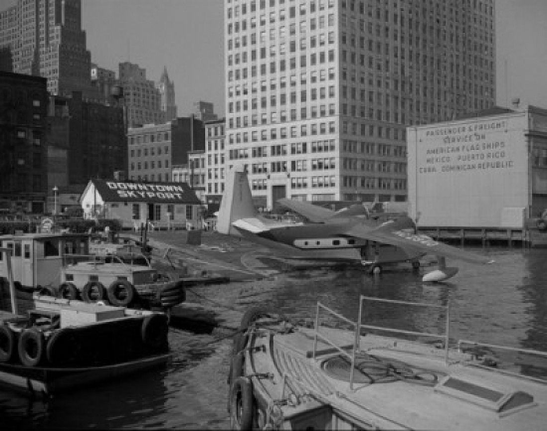USA New York State New York City Downtown New York City Skyport amphibious aircraft taking off Canvas Art - (18 x 24)