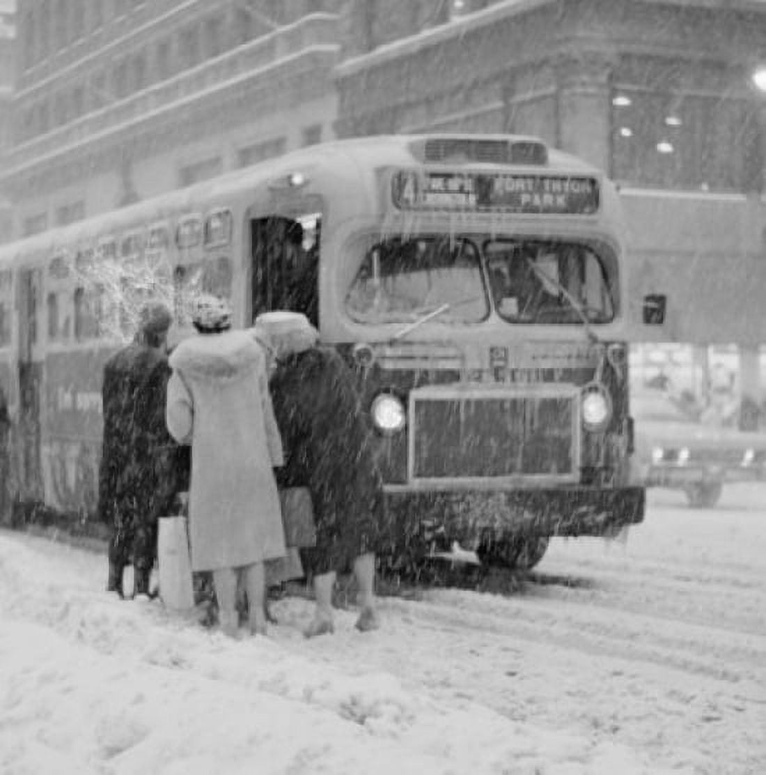 USA New York State New York City People boarding bus on Fifth Avenue near 40th Street winters day Canvas Art - (18 x 24)