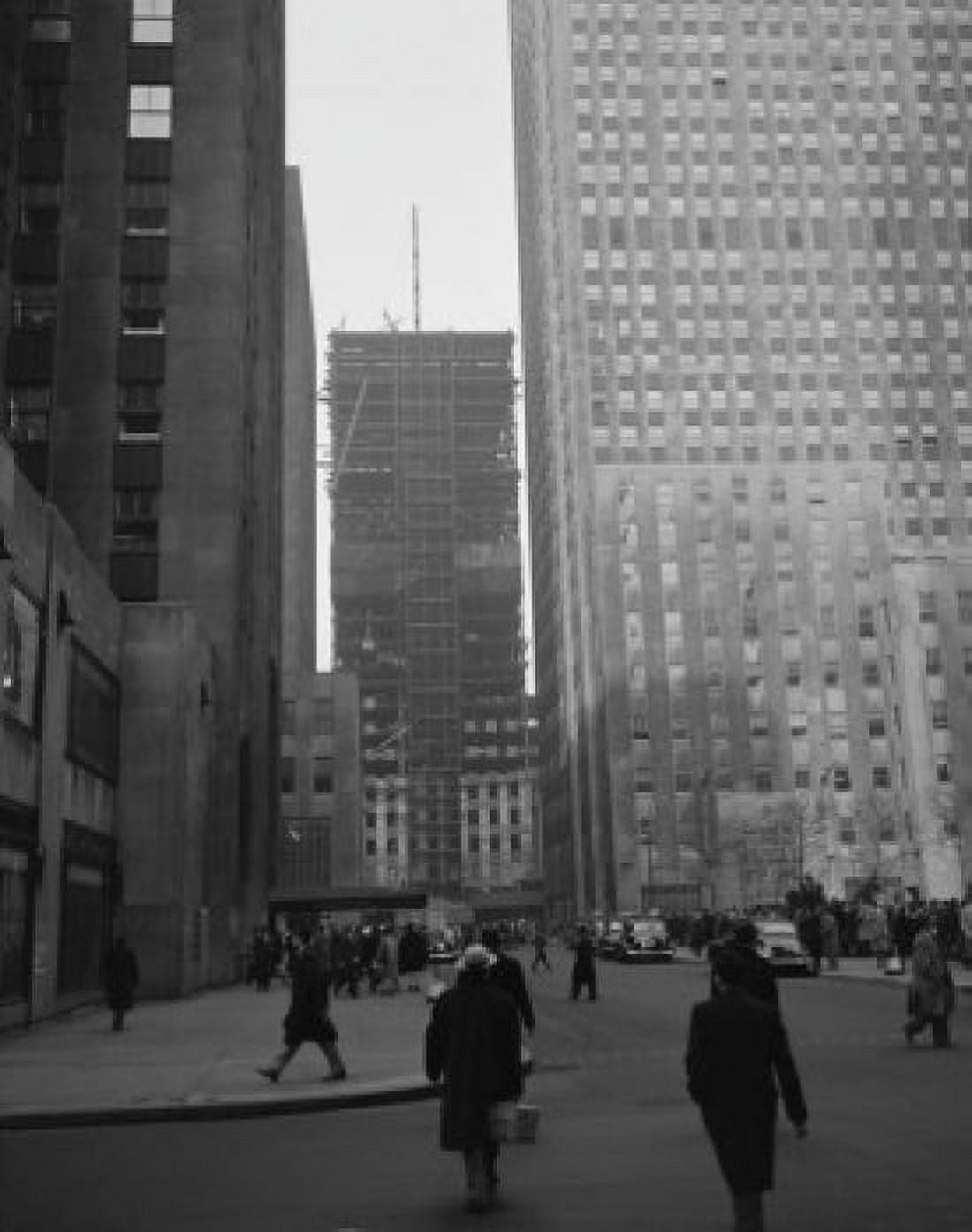 USA New York State New York City People walking on street skyscraper in construction in the background Canvas Art - (24 x 36)