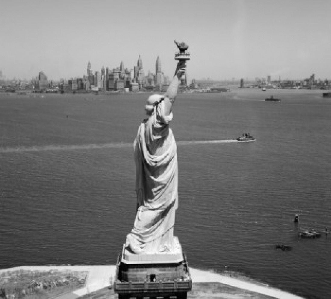 USA New York Statue of Liberty side view with Lower Manhattan Skyline Canvas Art - (24 x 36)