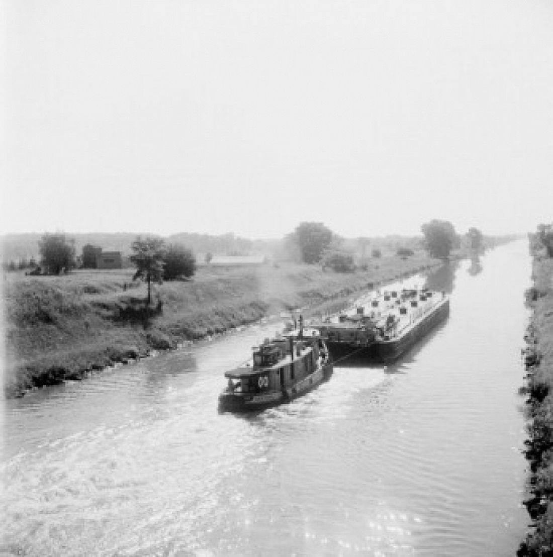 USA New York Tugboat pushing oil tanker on Erie Canal near Richester Canvas Art - (18 x 24)