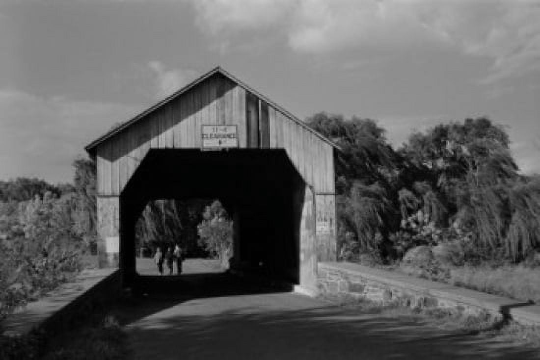 USA Pennsylvania People walking under covered bridge Canvas Art - (24 x 36)