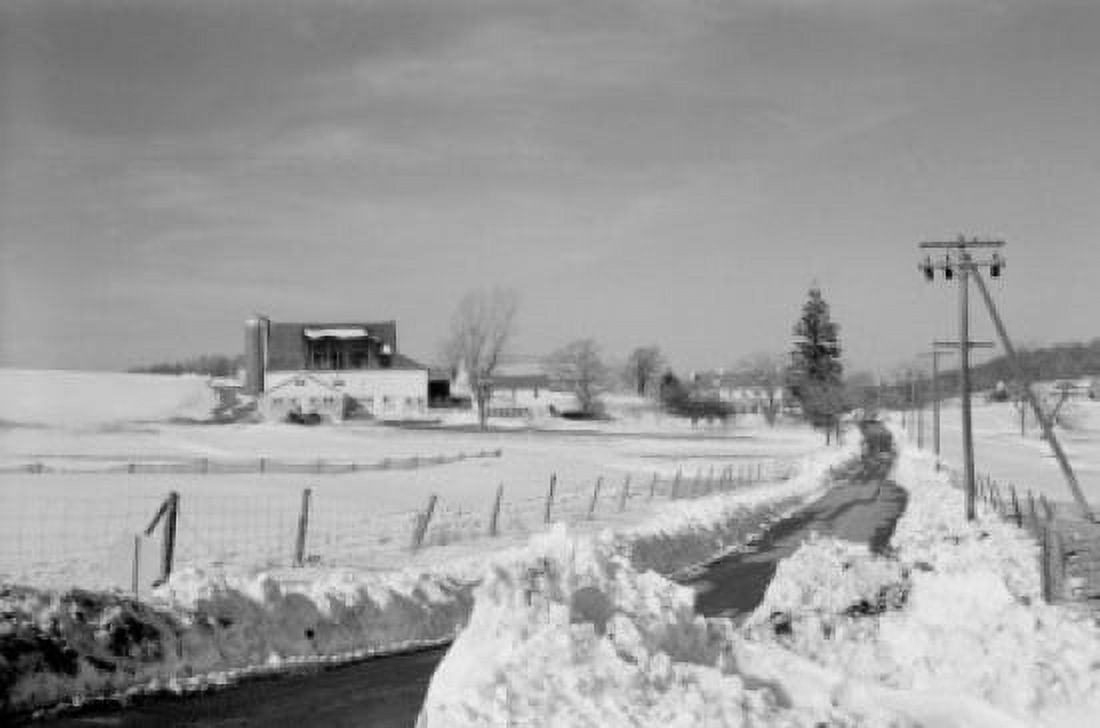 USA Pennsylvania Road through snow covered fields Canvas Art - (18 x 24)