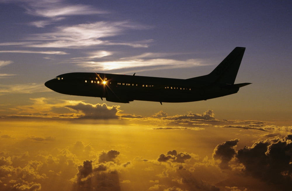 USA Silhouette of airplane in sunset sky Hawaii Canvas Art - David Cornwell Design Pics (34 x 22)