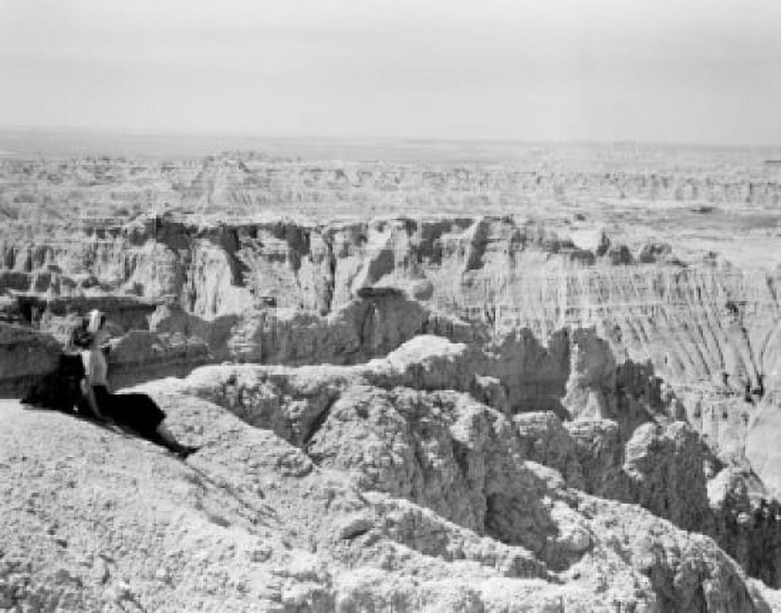 USA South Dakota South Dakota Badlands Female tourist watching lover landscape Canvas Art - (24 x 36)