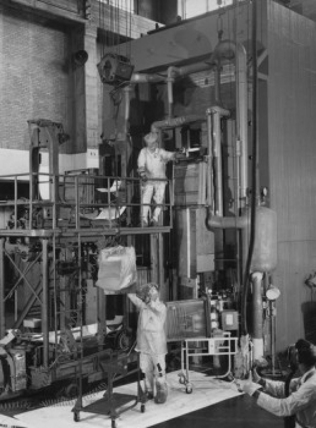 USA Tennessee Oak Ridge Oak Ridge National Laboratory three scientists working in nuclear laboratory Canvas Art - (18 x 24)