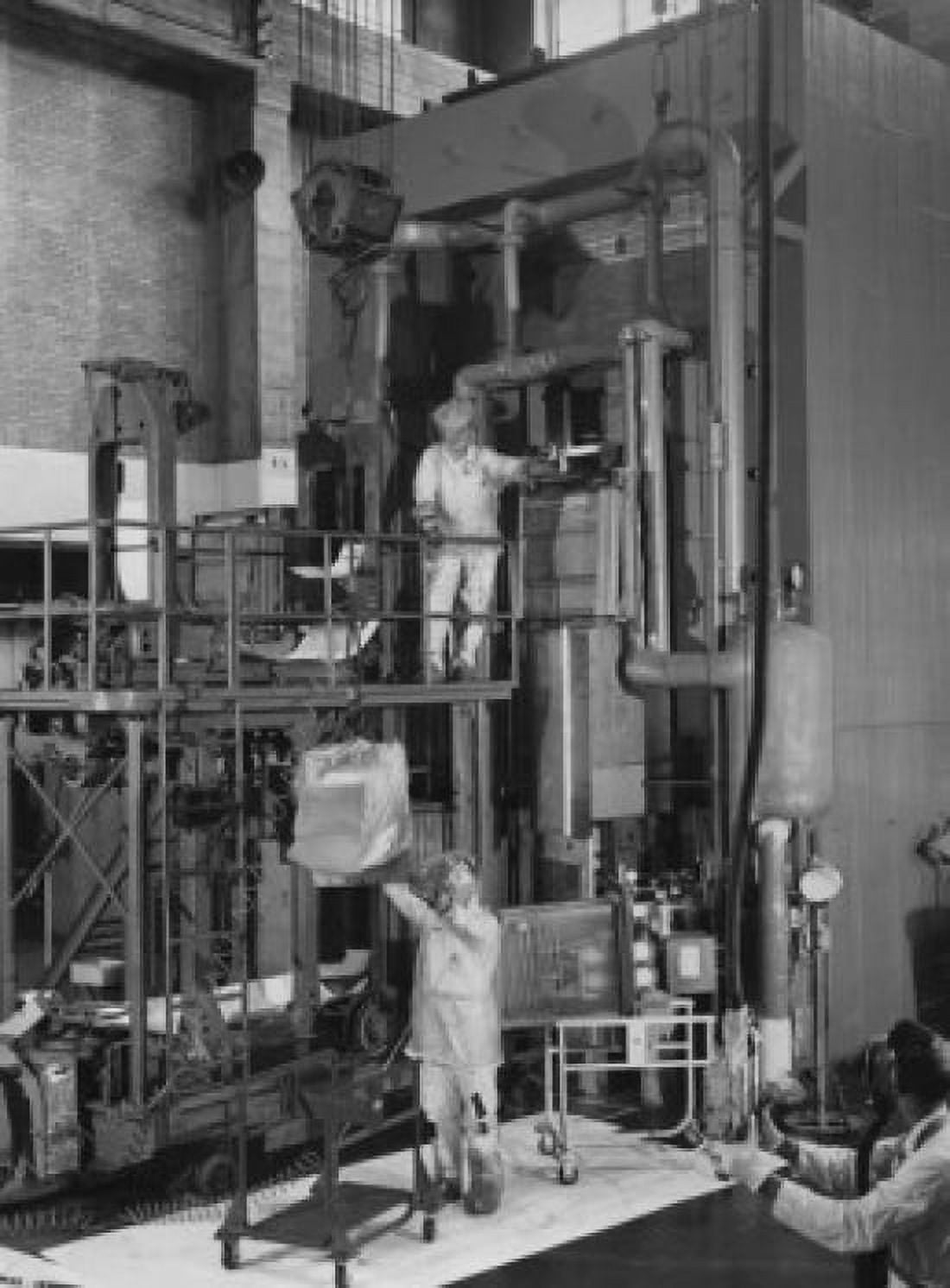 USA Tennessee Oak Ridge Oak Ridge National Laboratory three scientists working in nuclear laboratory Canvas Art - (24 x 36)