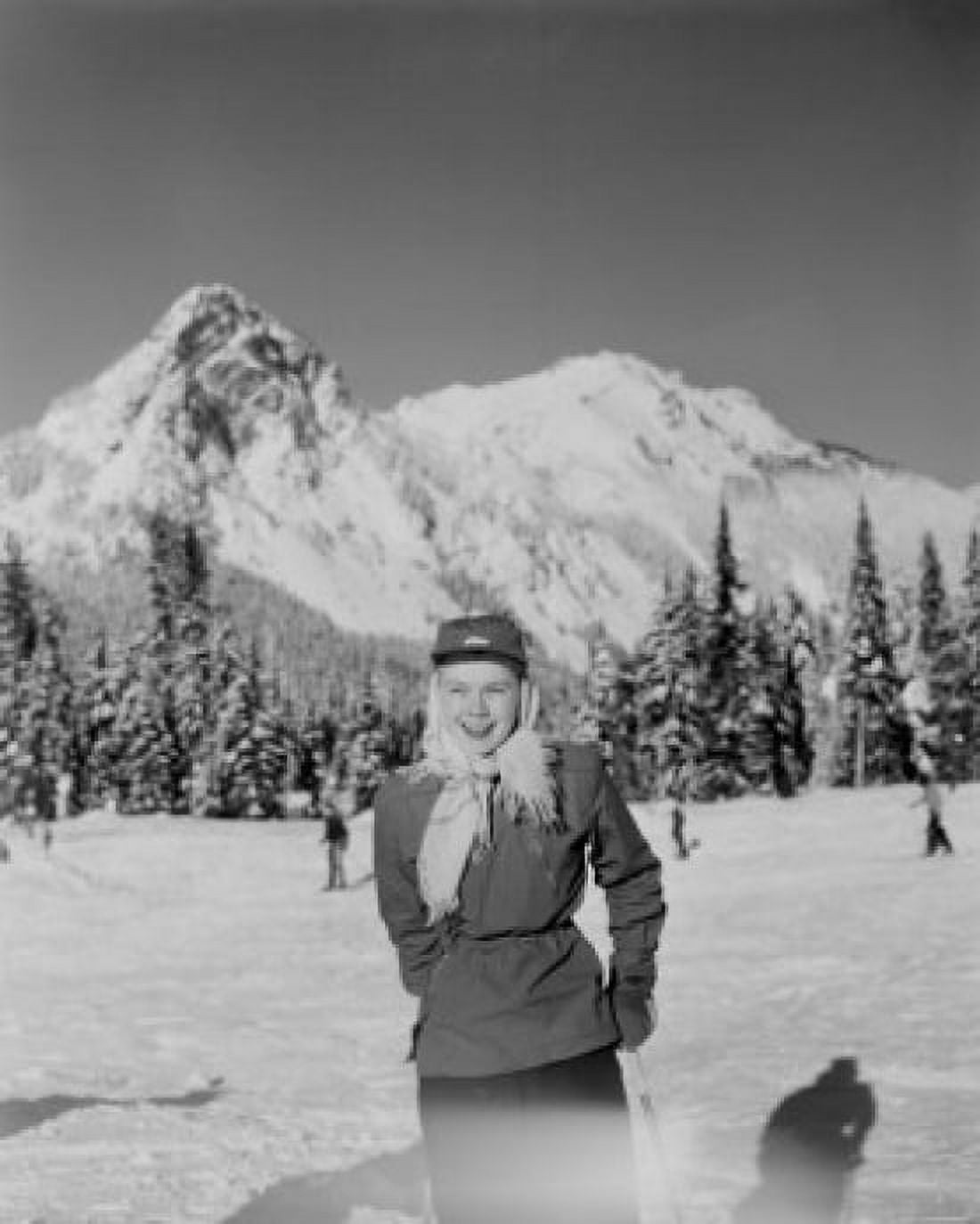 USA Washington near Seattle woman skier with mountains in background Canvas Art - (24 x 36)