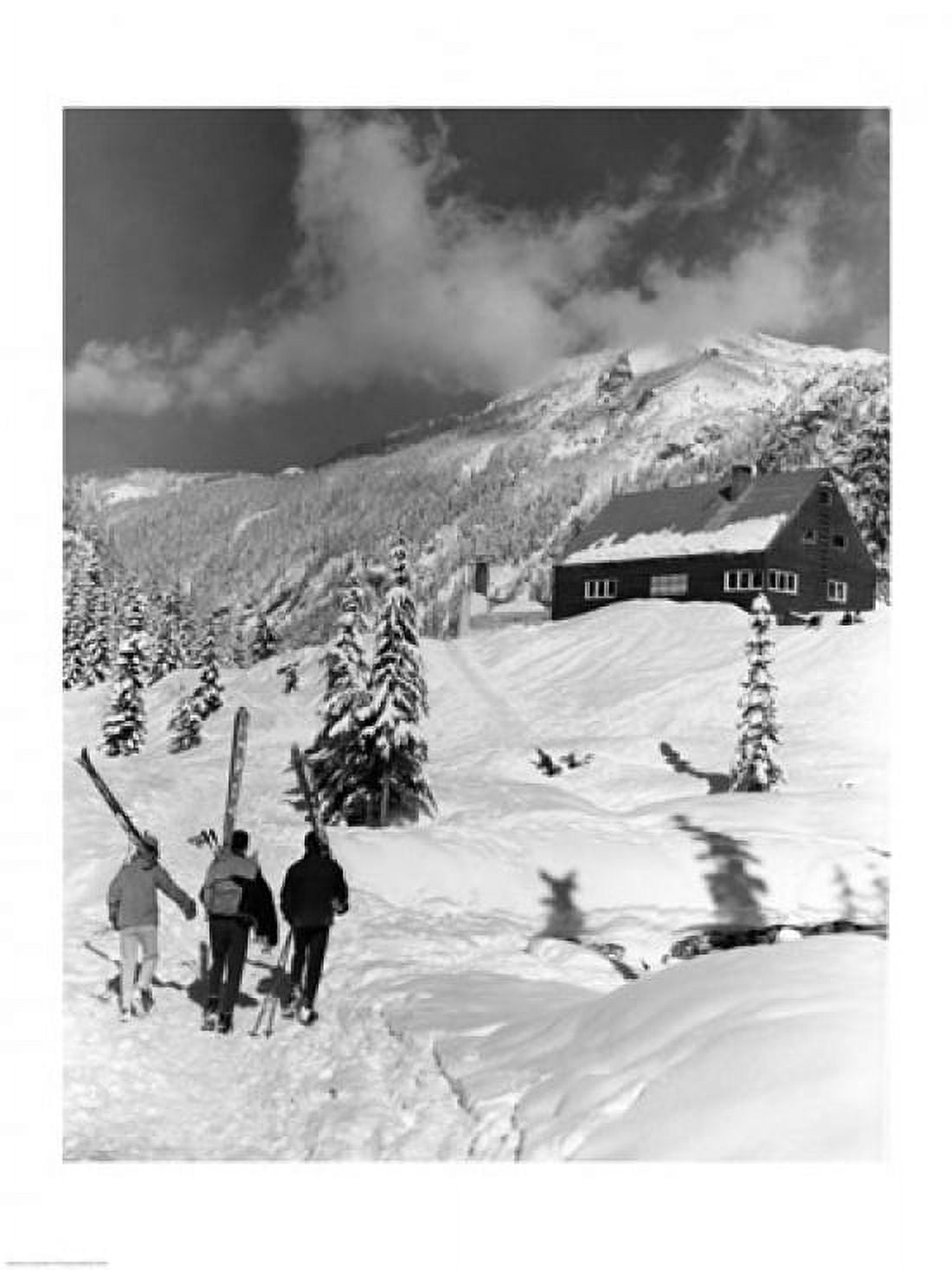 USA Washington state three people carrying their skis Canvas Art - (18 x 24)