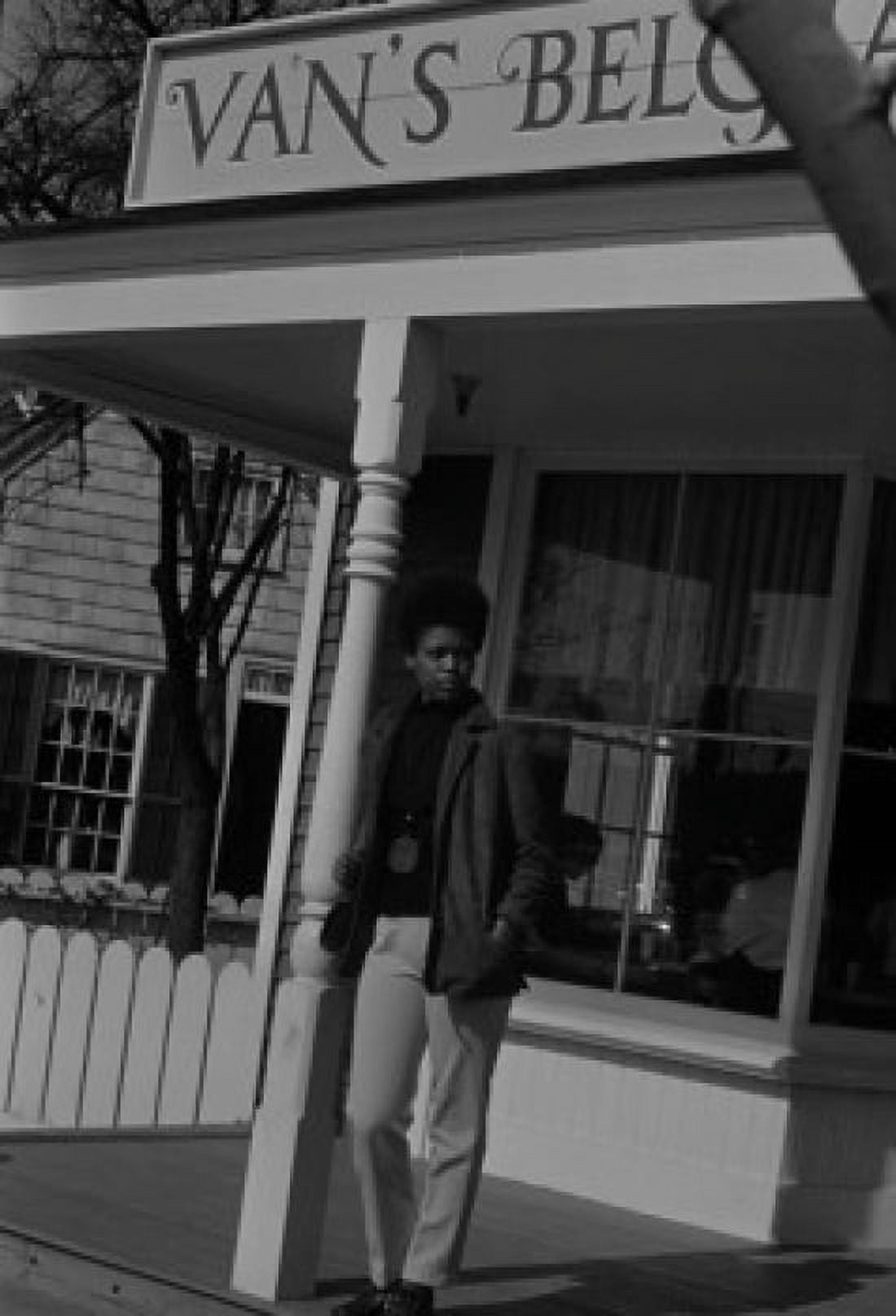 USA Young woman standing on cafes porch Canvas Art - (24 x 36)