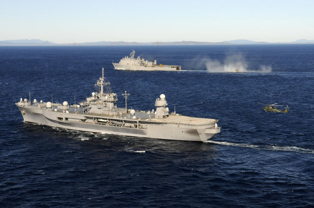 USS Blue Ridge conducts flight operations in the Coral Sea while underway with USS Germantown Canvas Art - Stocktrek Images (35 x 23)