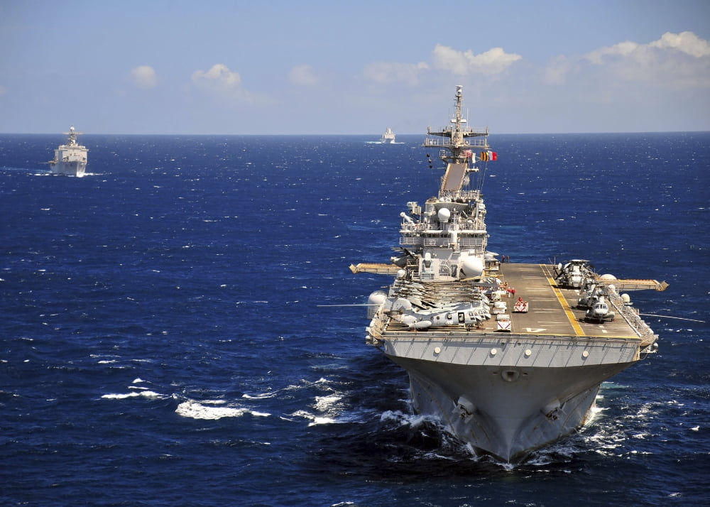 USS Boxer leads a convoy of ships in the Indian Ocean Canvas Art - Stocktrek Images (33 x 24)