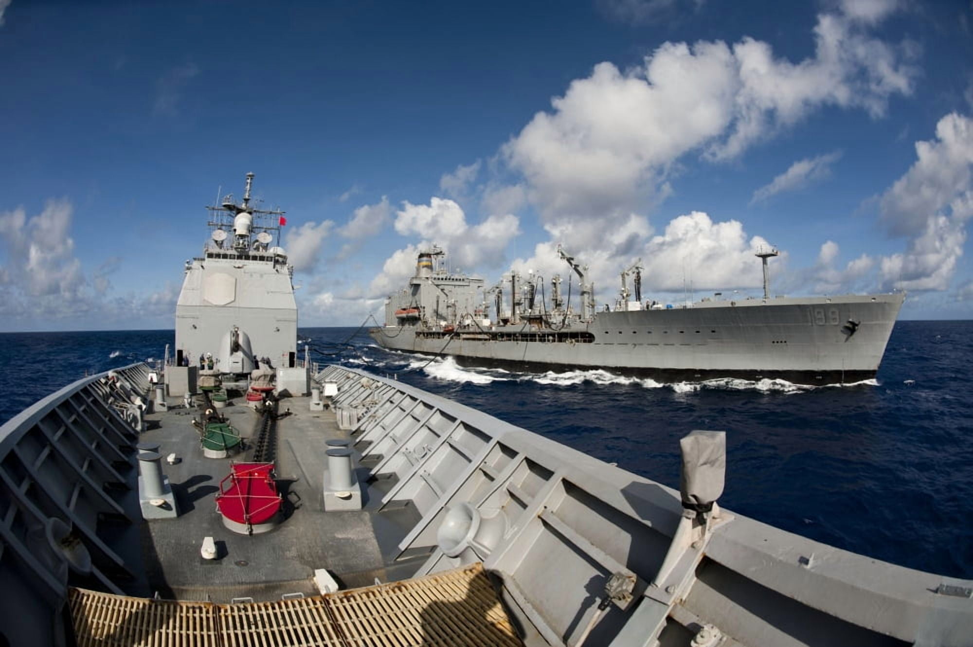USS Cowpens transits alongside USNS Tippecanoe Canvas Art - Stocktrek Images (35 x 23)