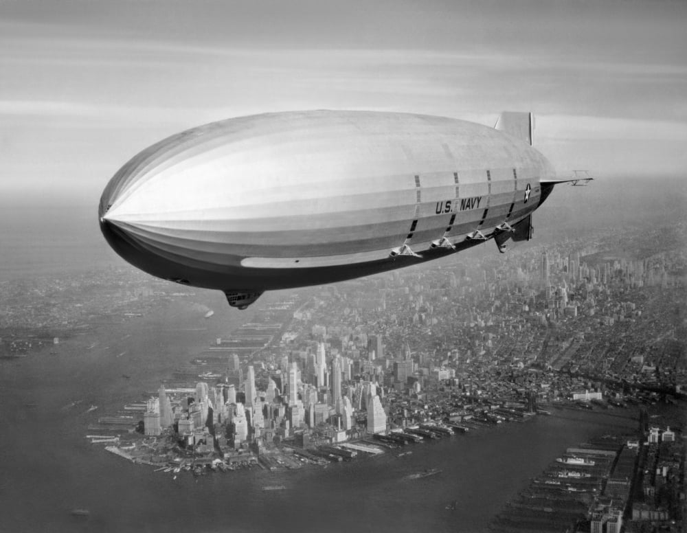 USS Macon Airship flying over New York City Canvas Art - John ParrotStocktrek Images (16 x 13)