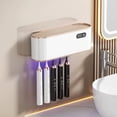 thumbnail image 1 of UV Toothbrush Sanitizer Holder for 4 | Wall Mounted Toothbrush Holder for Bathroom with Fan Drying | USB Rechargeable Toothbrush Cleaner & Sterilizer, No Drill Install, Modern Design (White), 1 of 3