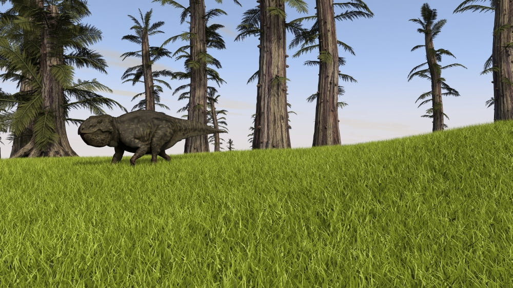 Udanoceratops walking across a grassy field Canvas Art - Kostyantyn IvanyshenStocktrek Images (19 x 11)