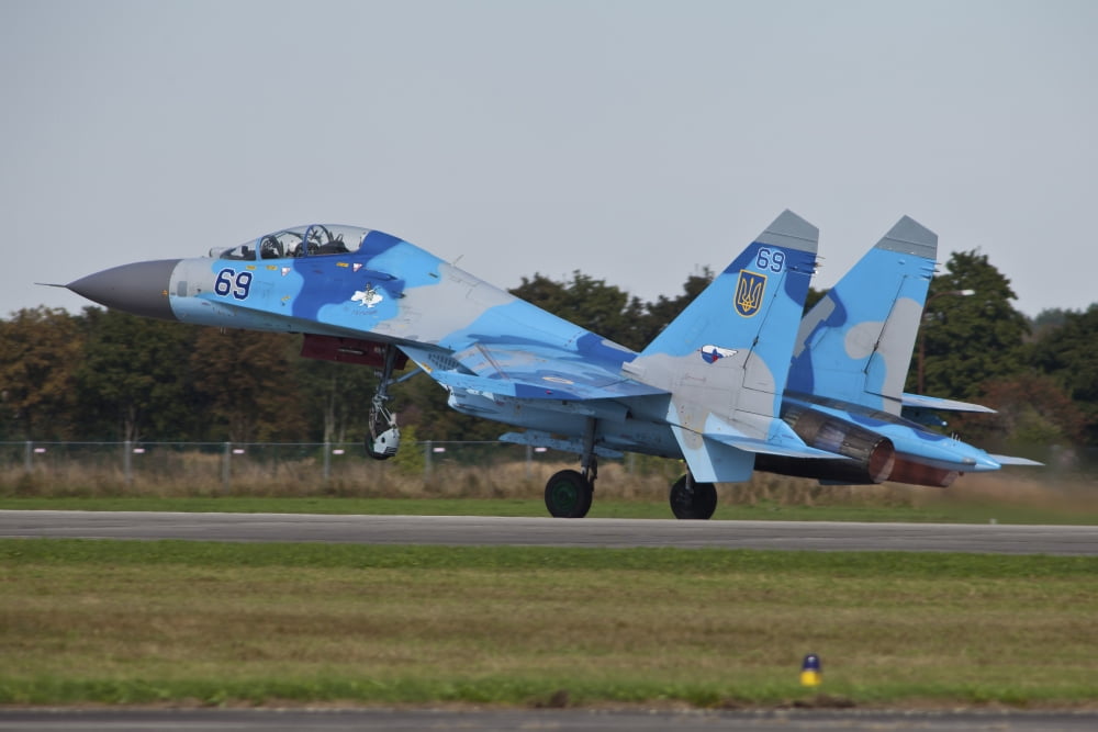 Ukrainian Air Force Su-27 Flanker taking off Canvas Art - Timm ZiegenthalerStocktrek Images (18 x 12)