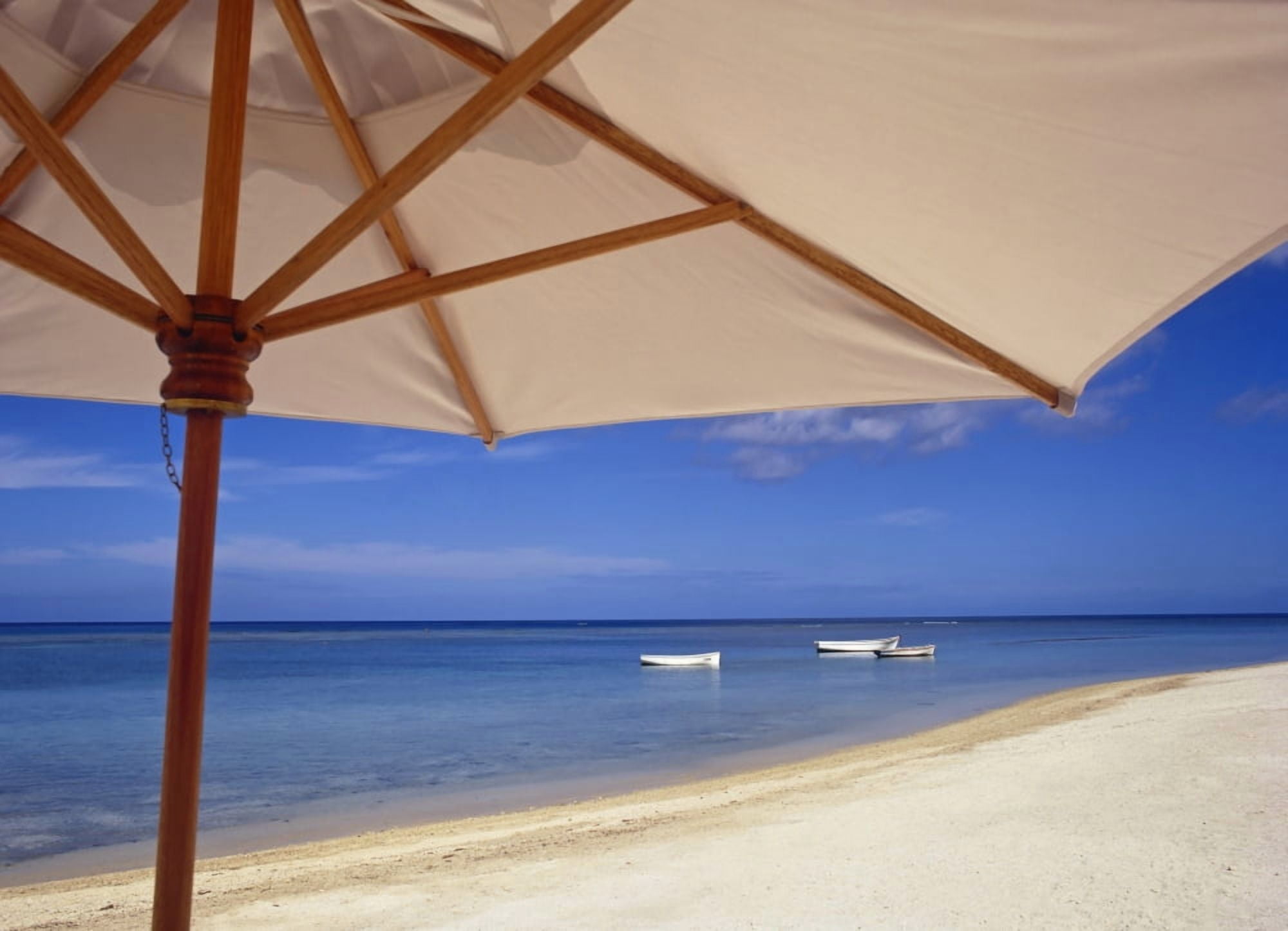 Umbrella And Tropical Beach Close Up Canvas Art - Chris Caldicott Design Pics (32 x 22)