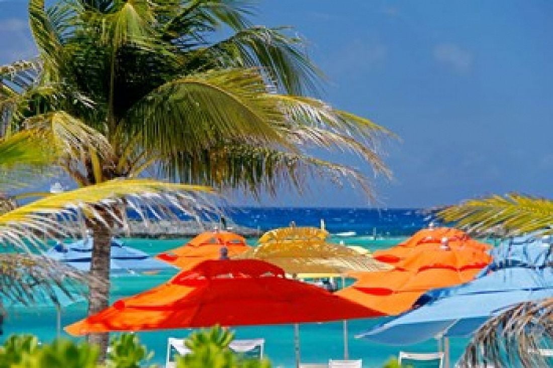 Umbrellas and Shade at Castaway Cay Bahamas Caribbean Canvas Art - Kymri Wilt DanitaDelimont (34 x 23)