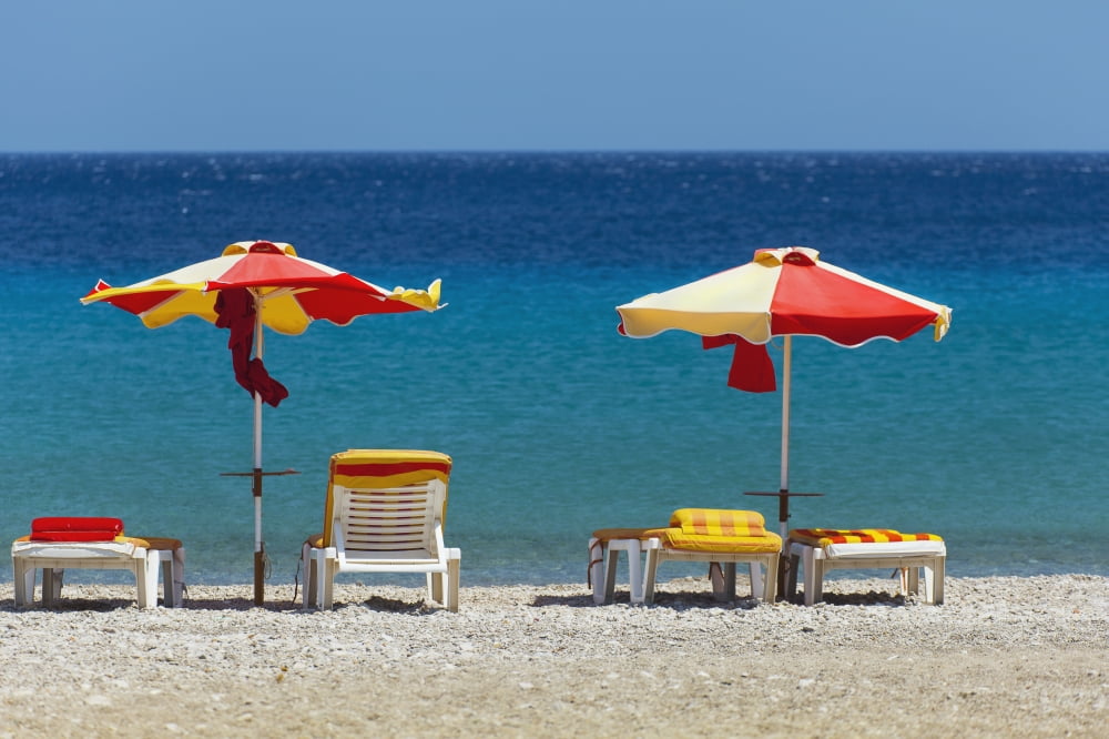 Umbrellas and beach chairs on a beach on the Island of Kos Kefalos Greece Canvas Art - Terence Waeland Design Pics (19 x 12)