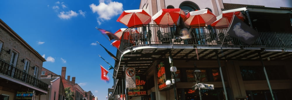 Umbrellas on a restaurant Big Easy Off Bourbon French Quarter New Orleans Louisiana USA Canvas Art - Panoramic Images (36 x 12)