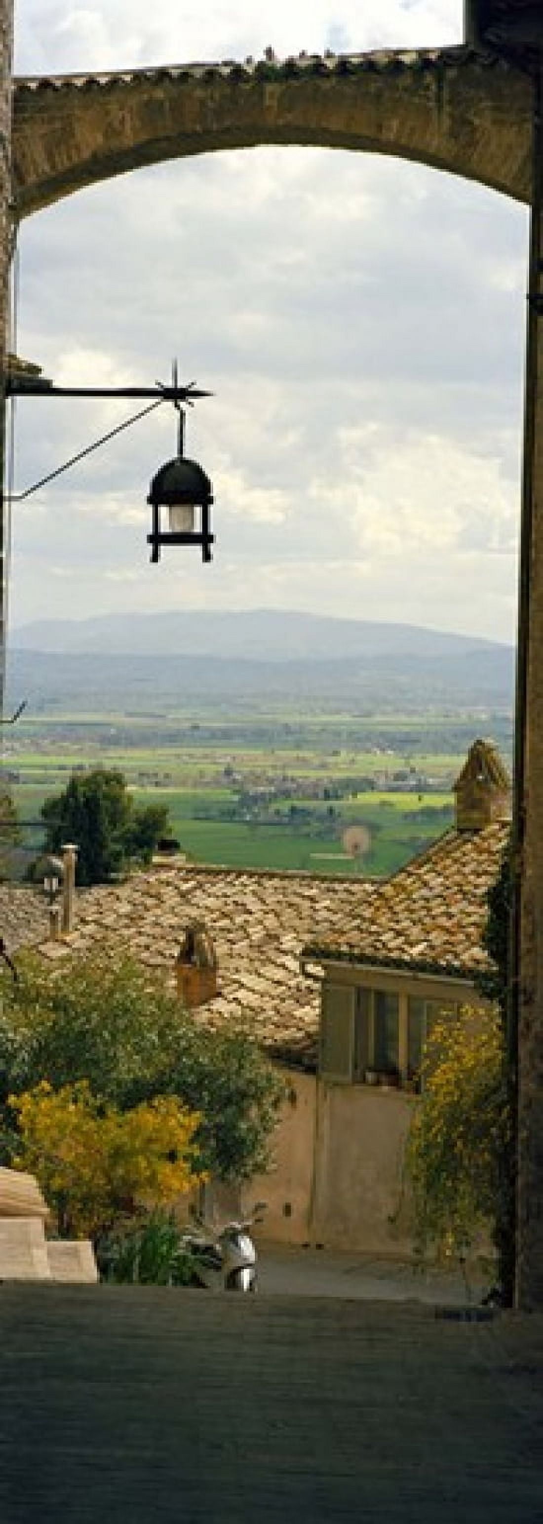 Umbrian countryside viewed through an alleyway Assisi Perugia Province Umbria Italy Canvas Art - Panoramic Images (18 x 7)
