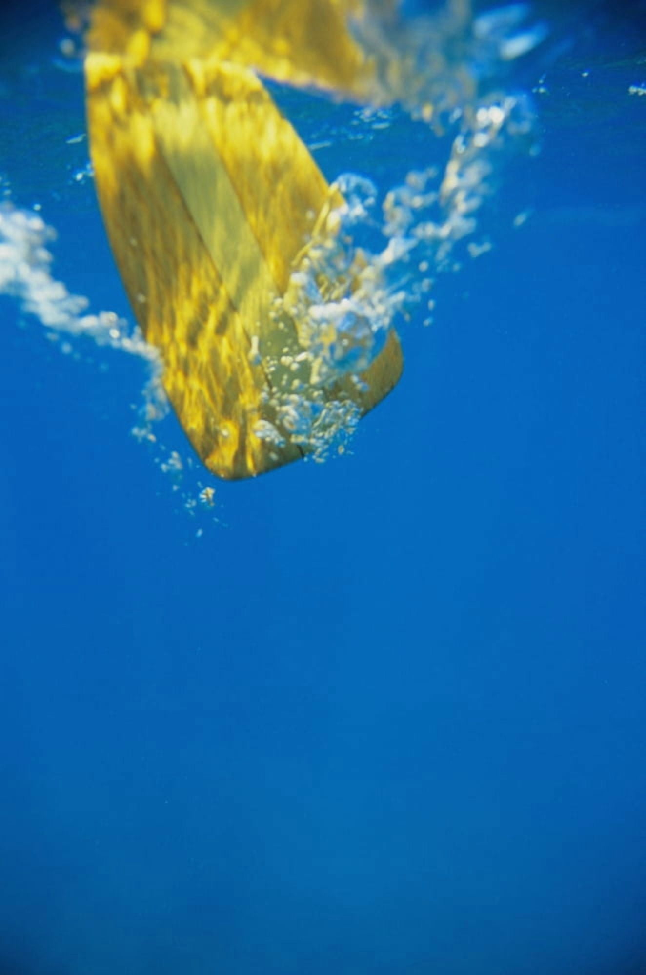Underwater View Of Yellow Paddle Stroking Water Creating Bubbles Canvas Art - Joss Descoteaux Design Pics (11 x 17)