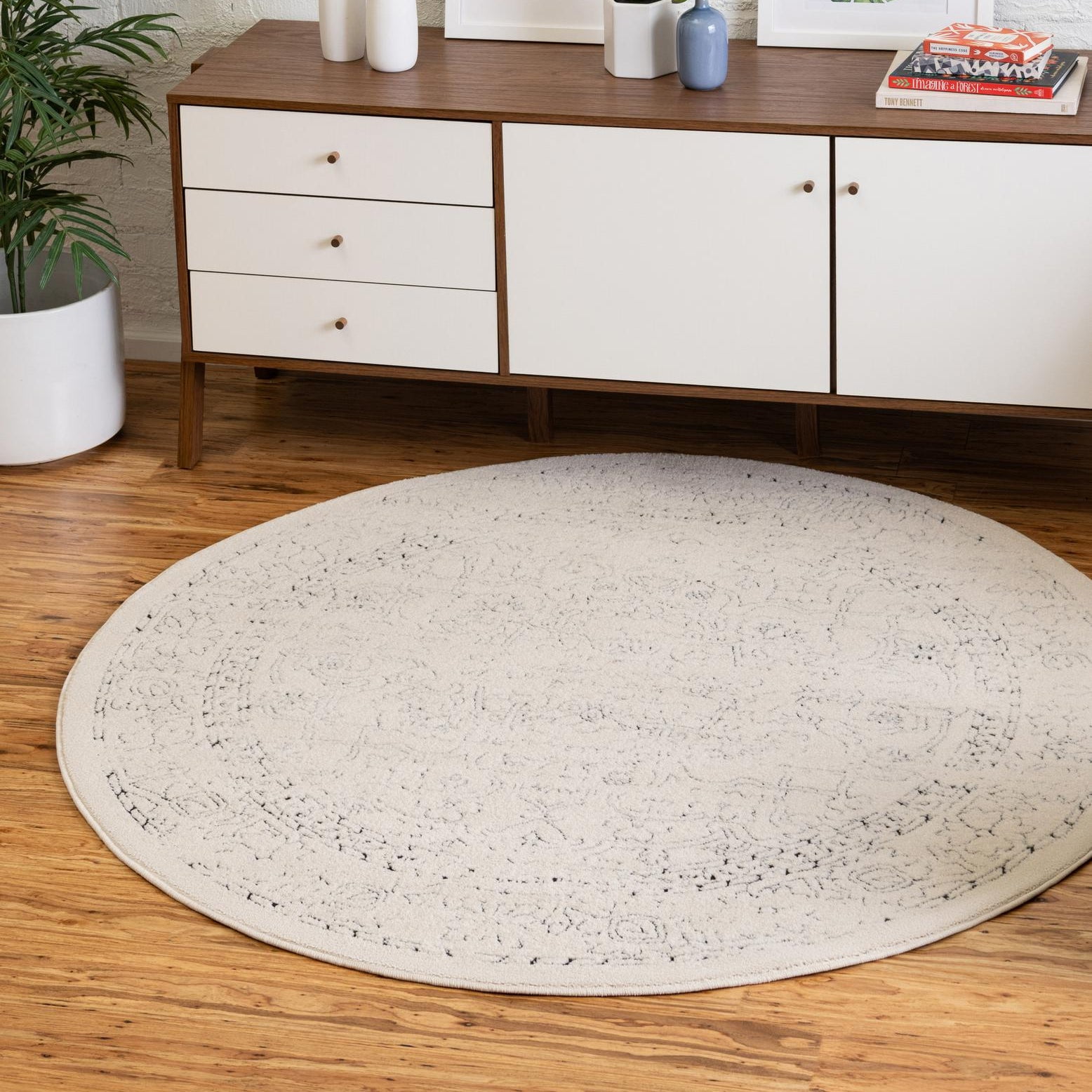 Ivory and Black Round Synthetic Kids Area Rug