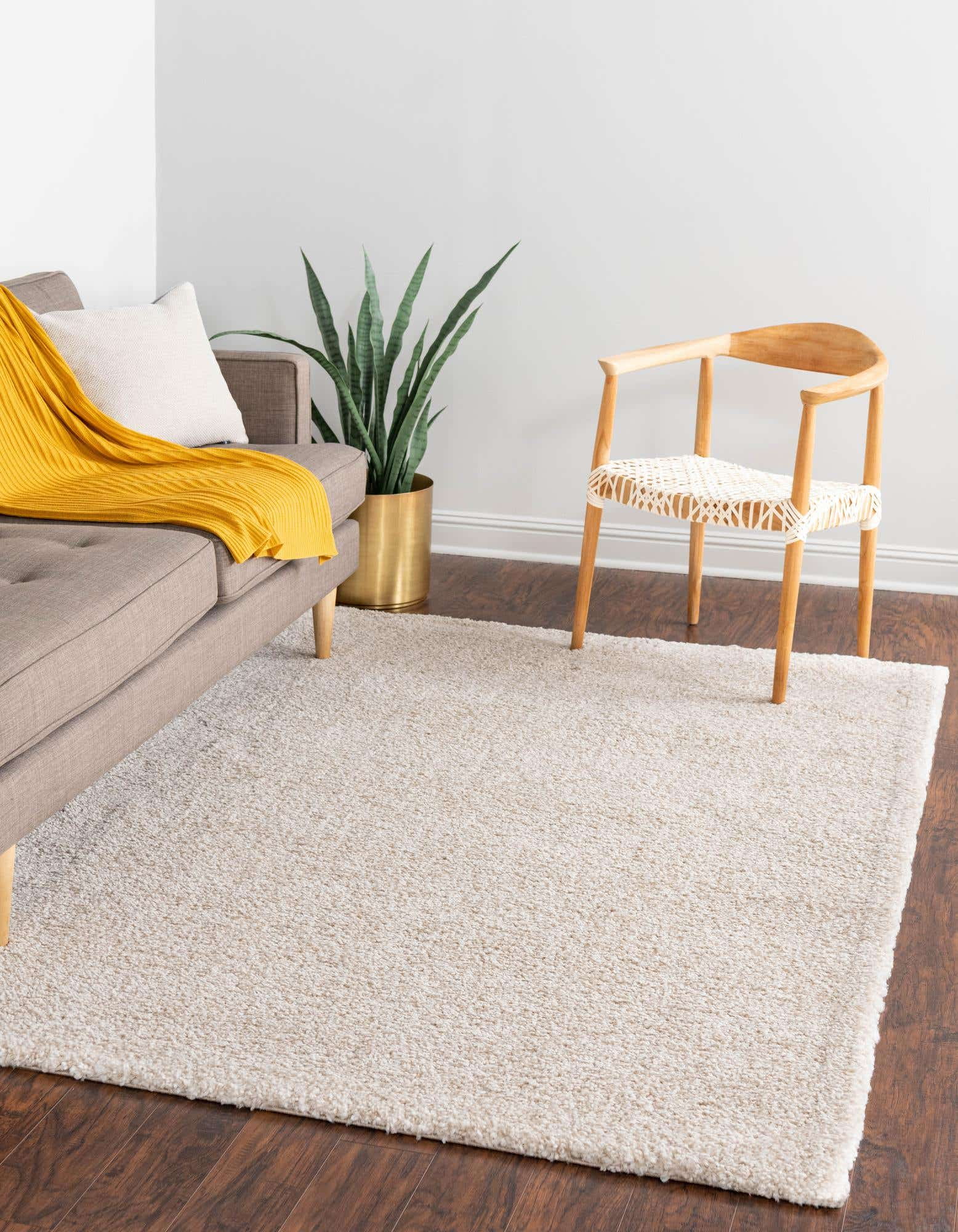 Ivory Rectangular 5' x 7' Solid Shag Synthetic Rug