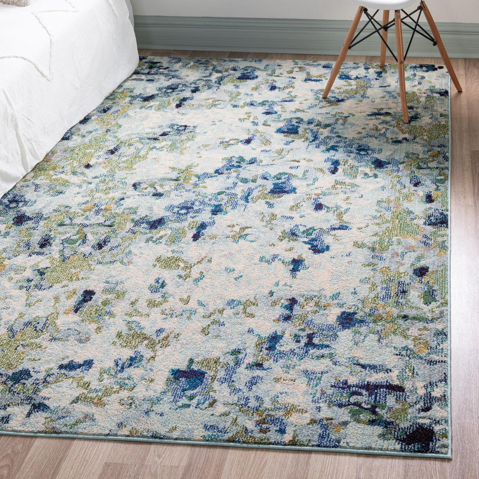 Luminous Abstract Light Blue 4' x 6' Easy-Care Synthetic Rug
