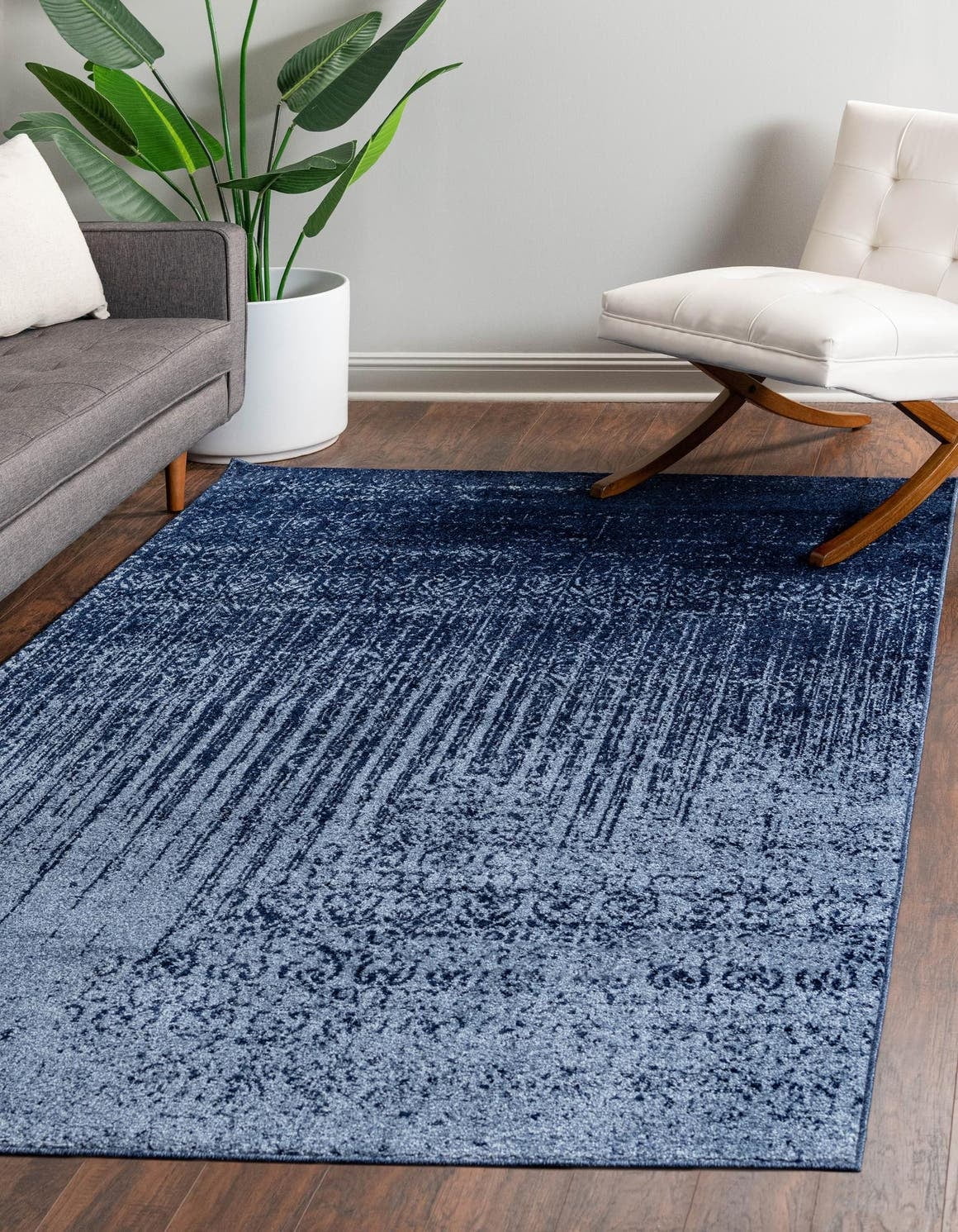Blue Tufted Synthetic Floral Motif Area Rug