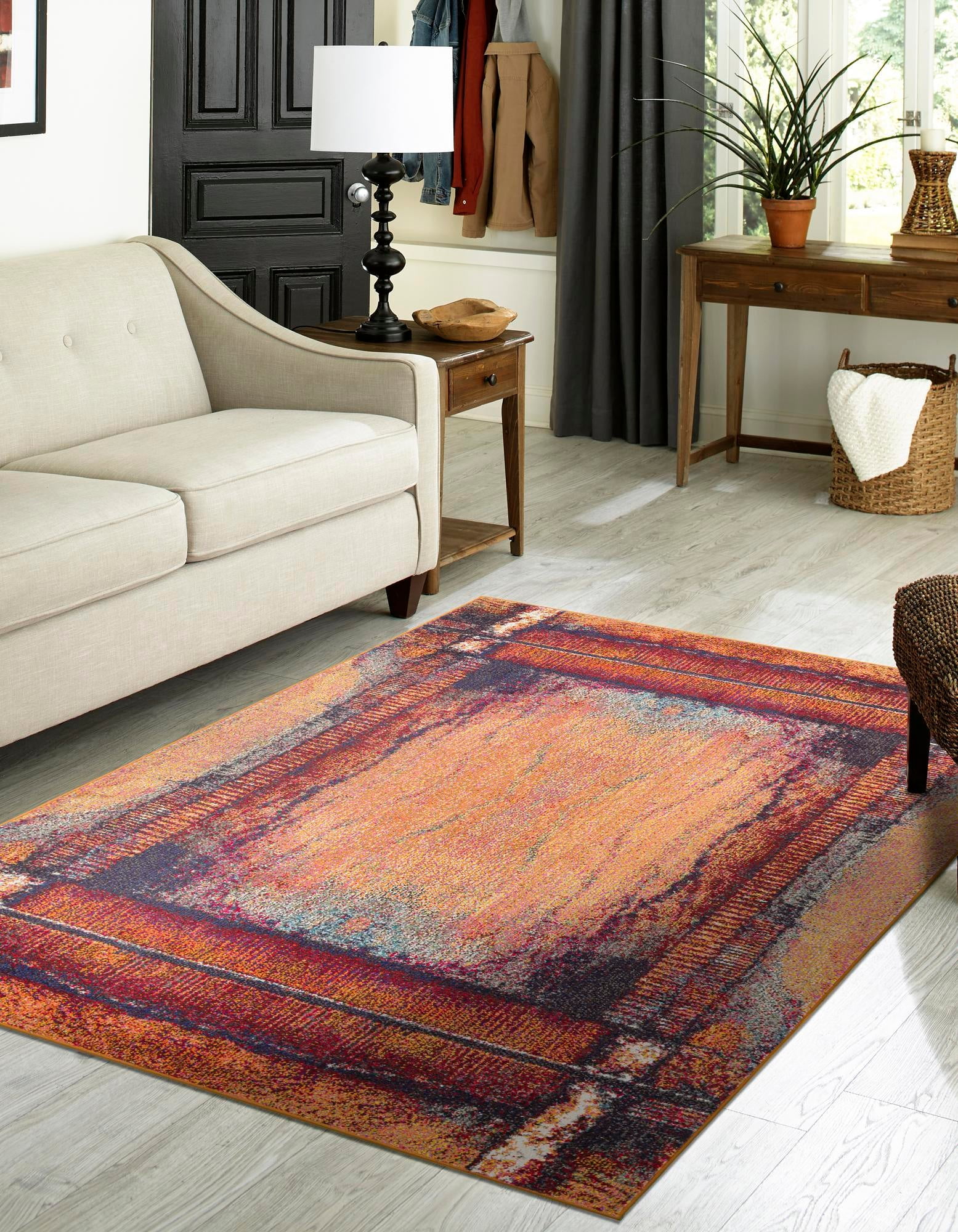 Estrella 7' x 10' Orange and Black Abstract Area Rug
