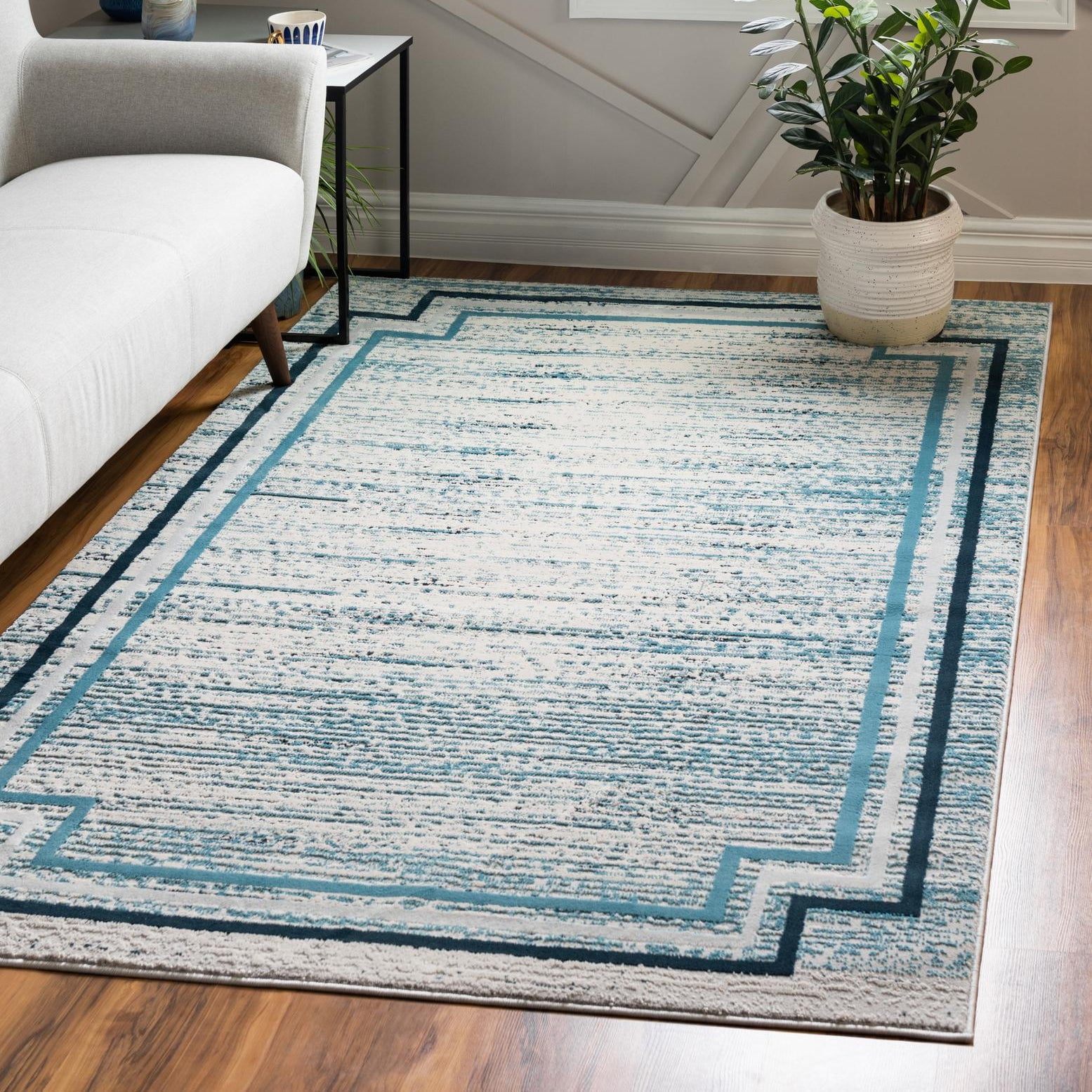 Blue and Ivory Abstract Braided Synthetic Rectangular Rug