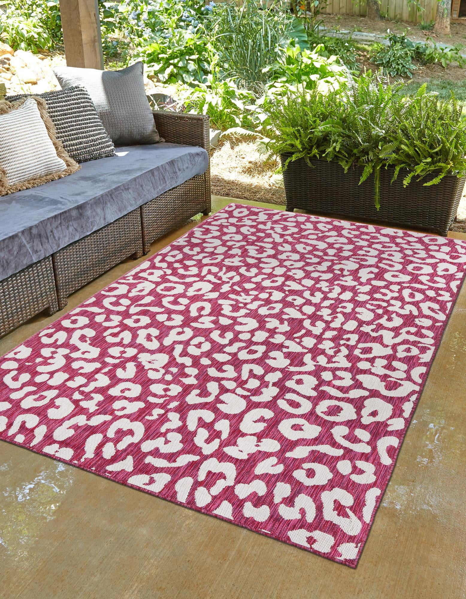Magenta and White Synthetic 4' x 6' Outdoor Area Rug