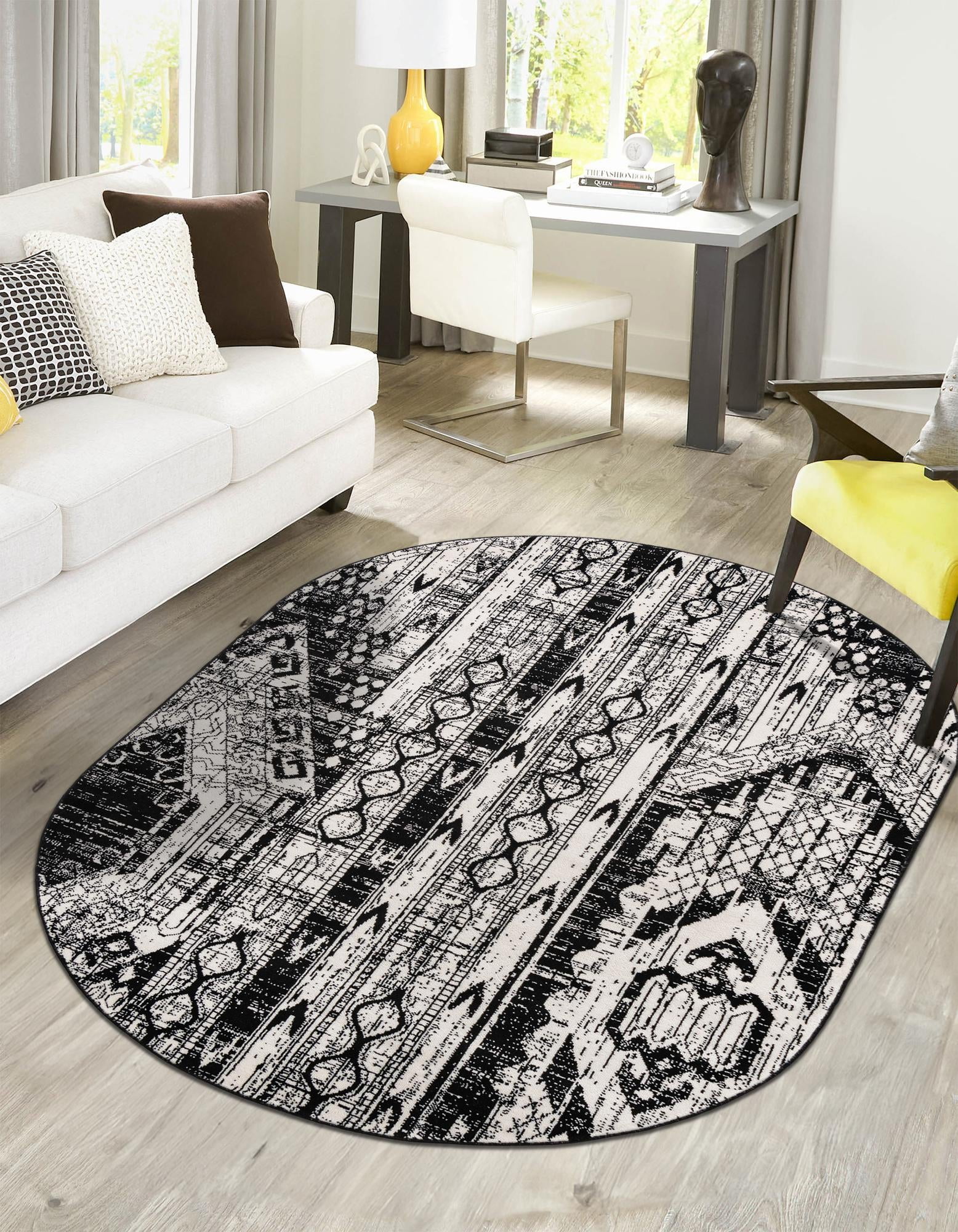 Oval Black and White Geometric Synthetic Indoor Area Rug