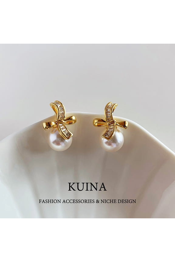 Unique bow earrings sterling silver needle pearl earrings new explosive models senior sense of light luxury gold earrings female