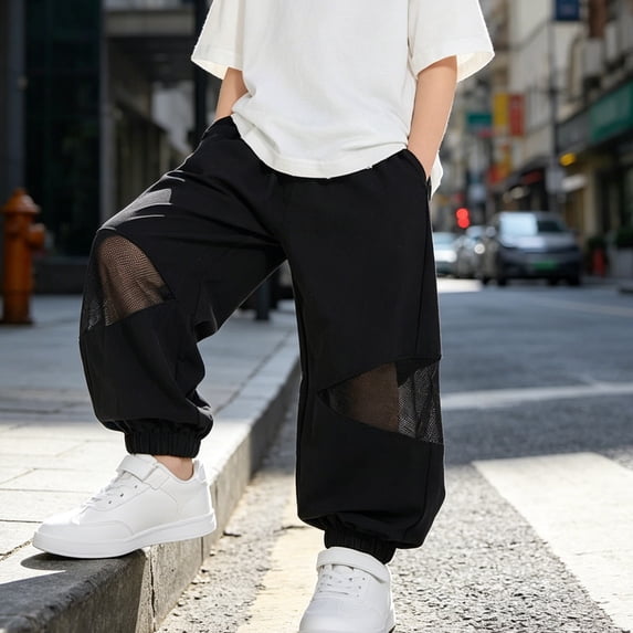 Unisex Kids Lightweight Airy Jogger Trousers, Side Mesh Spliced Elastic Ankle Pants for Shopping and Daily Indoor Activities Black 130