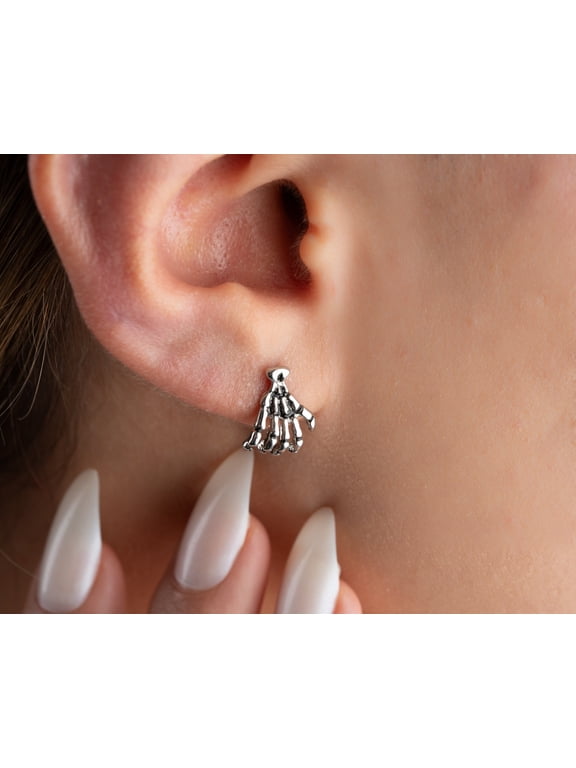 Unleash your rebellious style with our Titanium Skeleton Hand Flat Back Push-In Stud Earring.