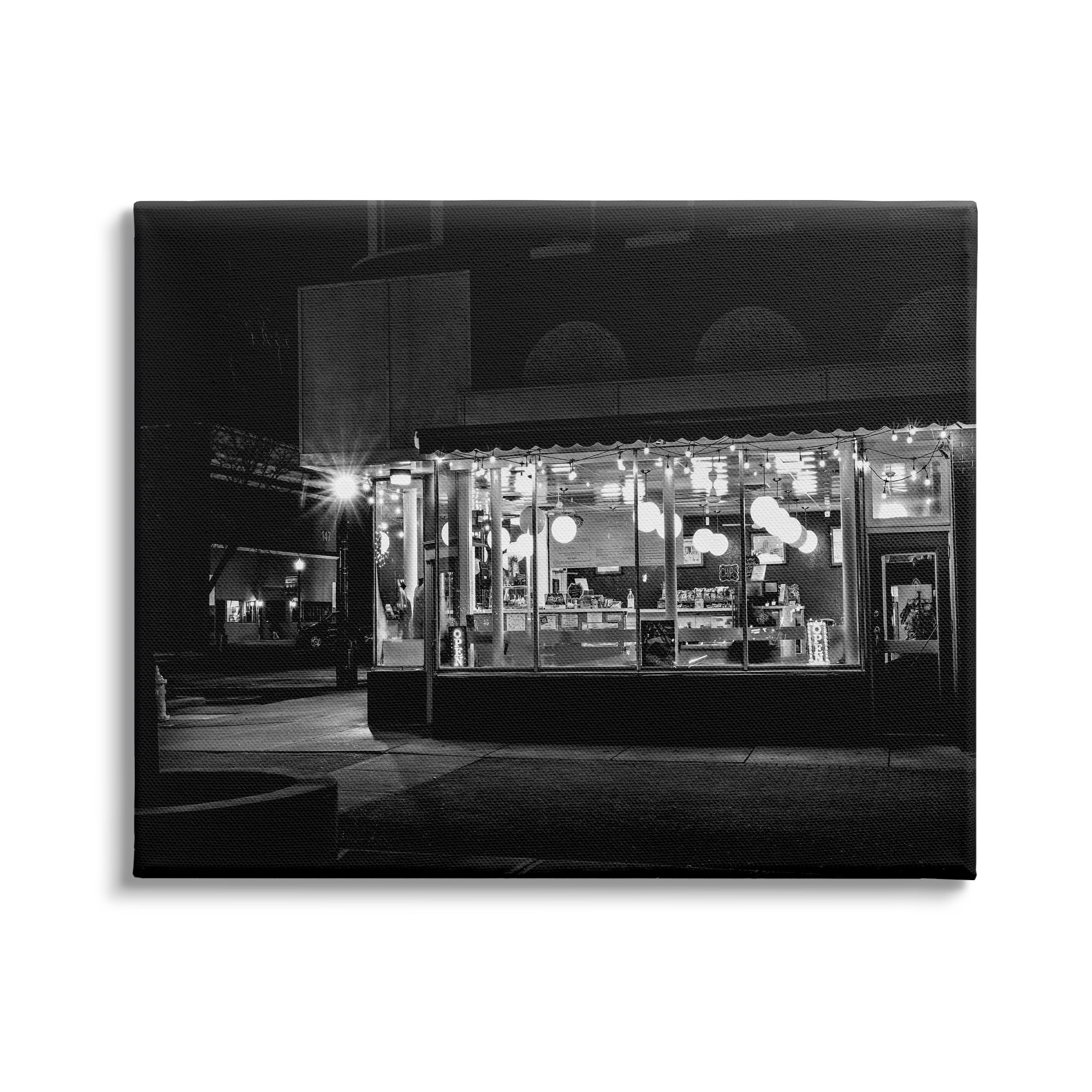 Urban City Diner Architecture Nighttime Black Whitey 48 in x 36 in Photography Canvas Art Print, by Stupell Home Décor