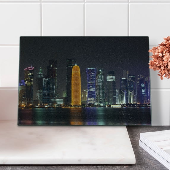 Urban Cutting Board, Qatar Middle East Town with Luminous Skyscraper at Night View, Decorative Tempered Glass Cutting and Serving Board, Small Size, Charcoal Grey Orange, by Ambesonne