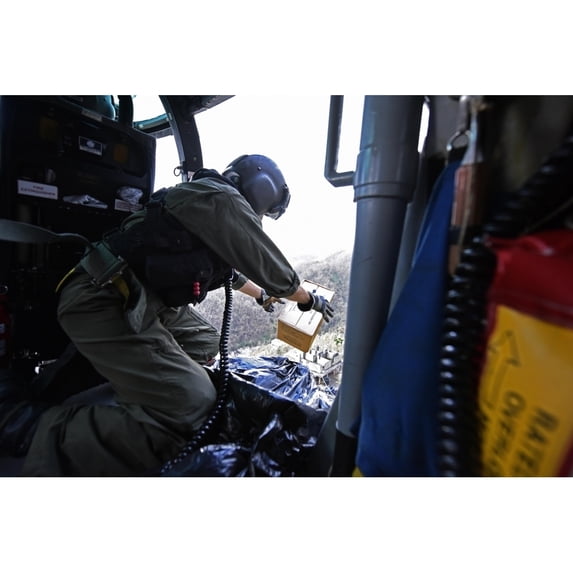 Us Coast Guard Helicopter Drops A Box Of Mres To Locals Near Utuado History (24 x 18)