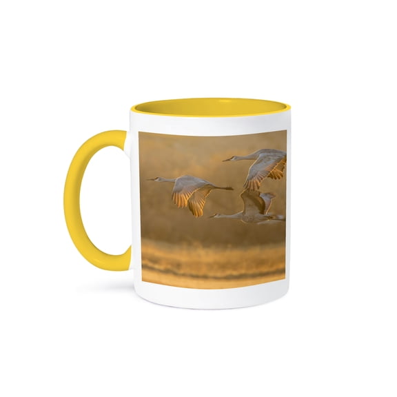 Usa, New Mexico, Bosque Del Apache. Sandhill Cranes Flying At Sunset., 11oz Two-Tone Yellow Mug