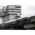 thumbnail image 1 of Uss Abraham Lincoln Arrives At San Diego Returning From A 10-Month Deployment In Arabian Gulf. The 'Mission Accomplished' Banner Reflects Early Optimism That Preceded Seven Years Of Insurgency, 1 of 1