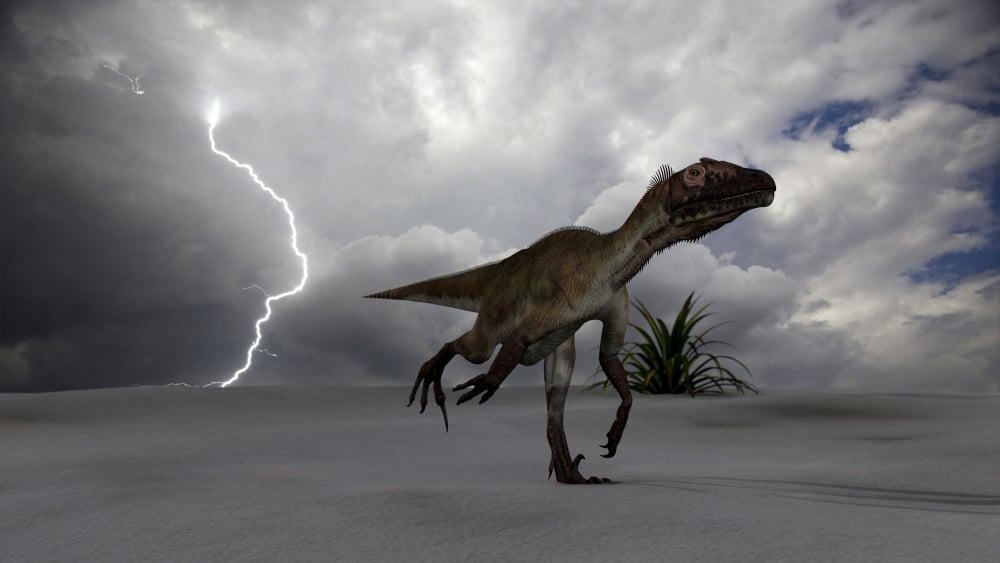 Utahraptor running across a desert during a lightning storm Canvas Art - Kostyantyn IvanyshenStocktrek Images (38 x 22)