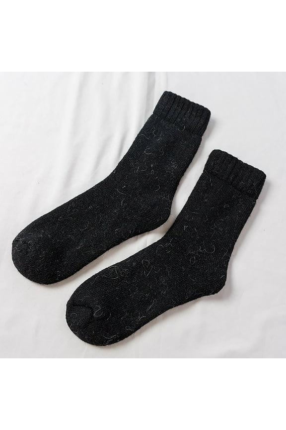 Keep Your Feet Toasty Warm All Winter Long with These Super Thick and Cozy Wool Socks. The Fleece-Lined Interior Provides Maximum Insulation, Making Them Perfect for Lounging at Home or