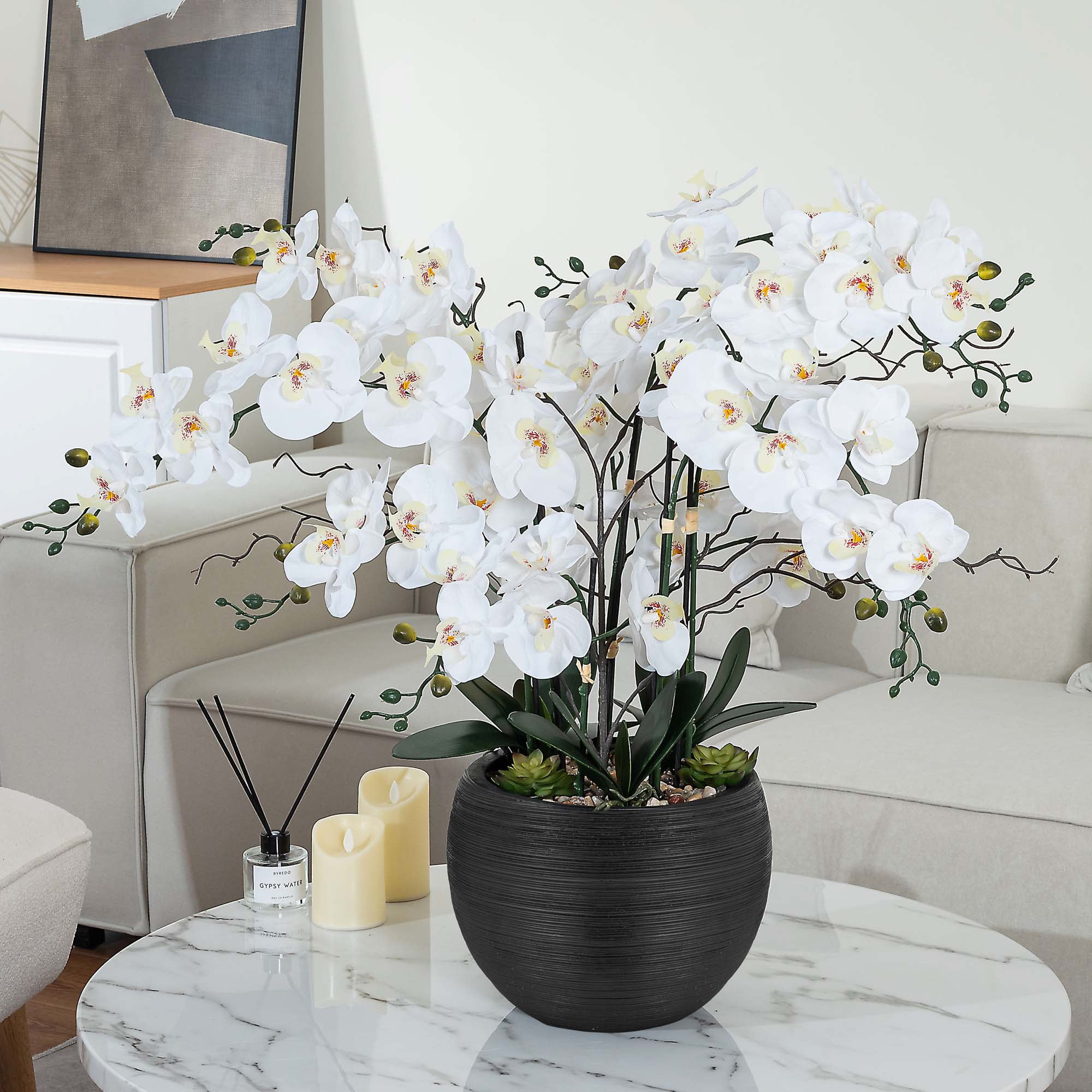 Large White and Green Plastic Orchid Arrangement in Black Pot
