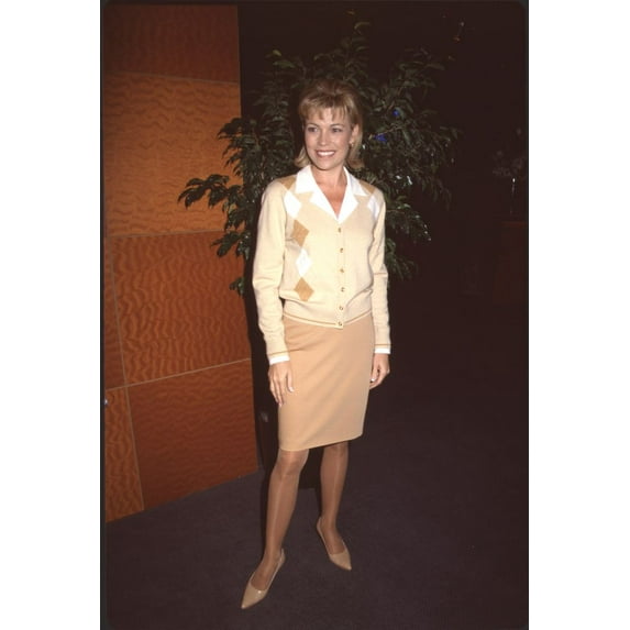 Vanna White In Tan Skirt And Argyle Sweater At 1999 Natpe Photo Print (16 x 20) - Item # CPA4083