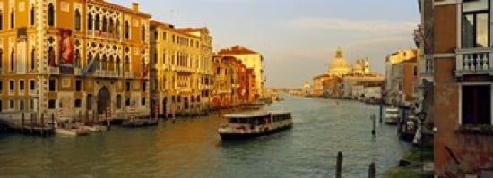 Vaporetto water taxi in a canal Grand Canal Venice Veneto Italy Canvas Art - Panoramic Images (36 x 13)